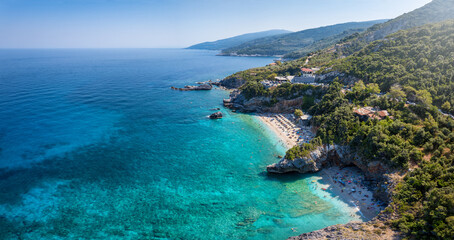 Aerial view of the coast of the North Pelion Mountain, Greece, with emerald shining sea at the...