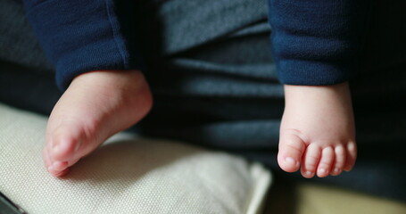 Closeup of cute adorable baby newborn feet
