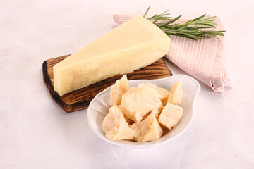 Chopped Italian hard parmesan cheese