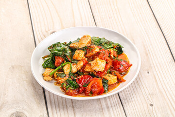 Chicken with tomato and spinach