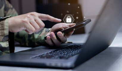 close up soldier man hand type on smartphone to check security system of access data in private...