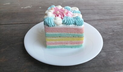 Happy birthday cake on wood background