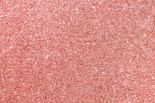 Pink glitter texture. Shining background.