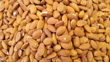 Closeup of an abundance of fresh almonds.