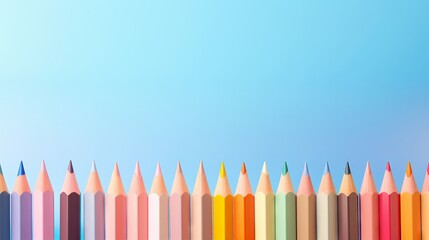 Ascending sharpness of pastel pencils on a sunny pastel backdrop