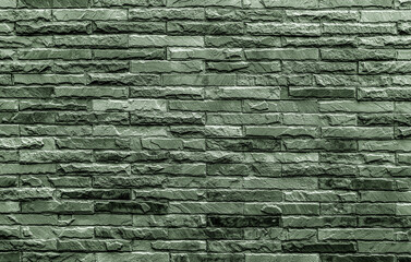Dark green bricks wall for abstract brick background and bricks texture.