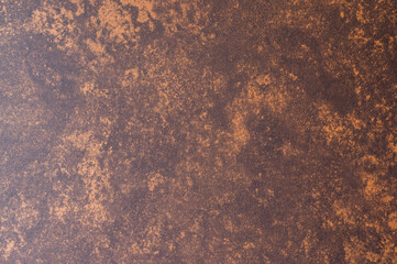 Old brown table with reddish, orange, brown metal texture, with rust, in an old house.