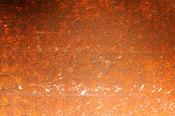 Old table with reddish, orange, brown metal texture, with rust, in an old house.