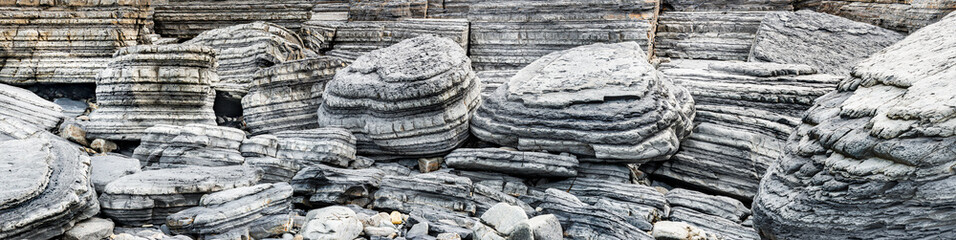 Panoramic View of Natural Striations in Coastal Boulders near Aberystwyth