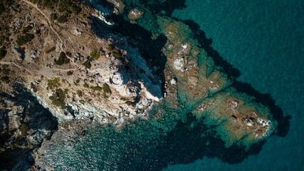 Drone photography genoise tower, cala and barcaggio beach with turquoise waters in Cap Corse 