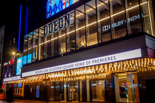 London. UK- 02.04.2024. Exterior night time view of the facade and entrance of the Odeon cinema in Leicester Square.