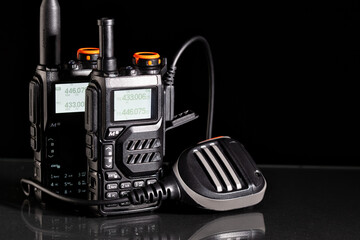 Portable two-way radios with microphone
