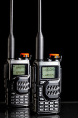 Two portable UHF radio transmitters