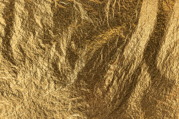 Texture Of Gold Foil Shiny Glitter Background