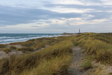 Fototapeta na wymiar Strand Grenen mit Dünen und Leuchtturm, Skagen, Nordjütland, Skagerrak, Dänemark
