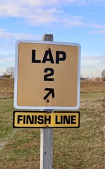 A close view of the yellow finish line signs.