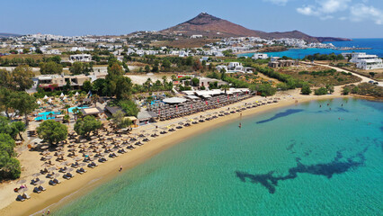 Aerial drone photo from sandy organised with umbrellas and sun beds beach of Pounta with crystal...