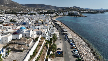 Fototapeta na wymiar Aerial drone photo of traditional whitewashed picturesque main village of Paroikia or hora with unique Cycladic architecture, Paros island, Cyclades, Greece