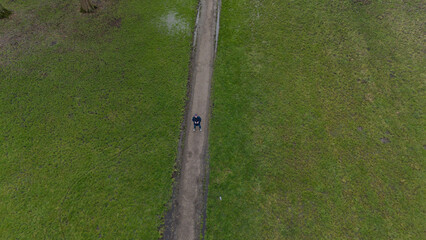 man looking up to see his drone