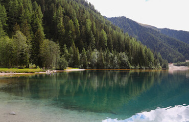 Reflections on the Anterselva lake in Alto Adige, Sudtirol, South Tyrol, Italy
