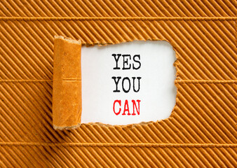 Motivational and Yes you can symbol. Concept words Yes you can on beautiful white paper. Beautiful brown paper background. Business motivational and Yes you can concept. Copy space.