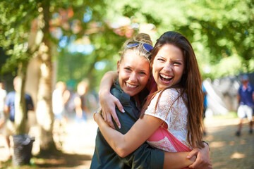 Portrait, girls or happy friends hug at music festival outdoor, event or bonding at concert. Face,...