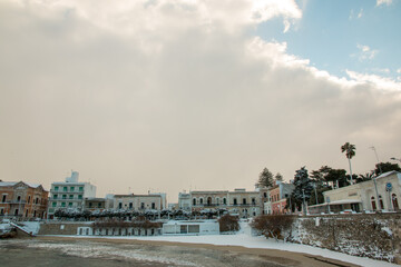Santa Maria al Bagno beach after a exceptional snowfall, Salento, Apulia, Italy