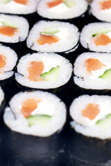 rolls with tuna on display close up