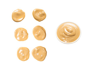 Mushroom sauce splashes isolated on white background.