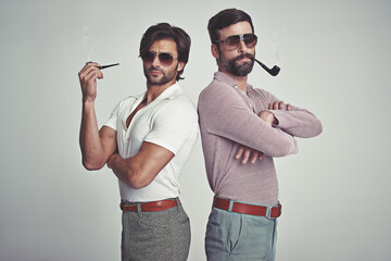 Fashion, men and sunglasses or pipe in studio with vintage model, hipster outfit and confidence...