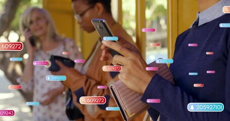 Animation of social media notifications over diverse women using smartphones at bus stop - Powered by Adobe