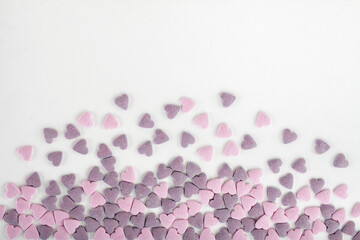 Colorful sugar sprinkles on white background