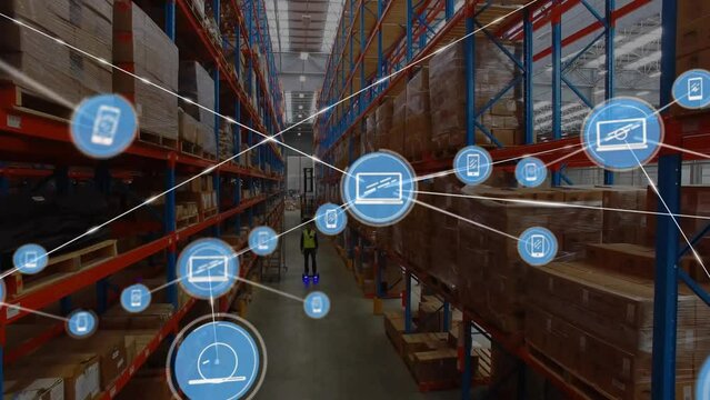 Animation of network of computer icons over male worker between shelves at warehouse