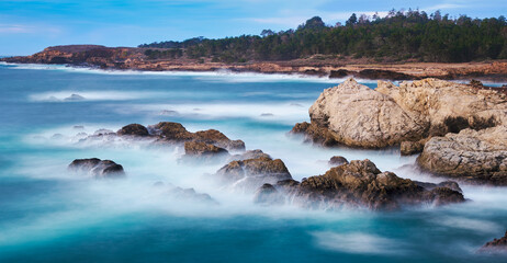 Naklejka na ściany i meble Long exposure on the shore of Point Lobos, California. 