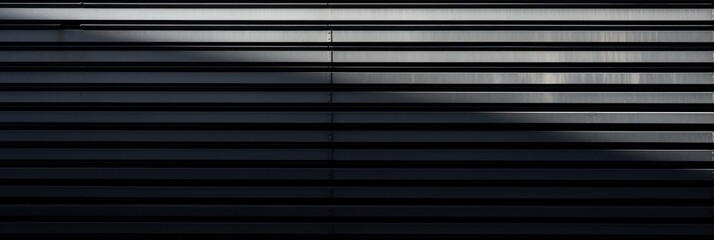 Black wall with shadows on it