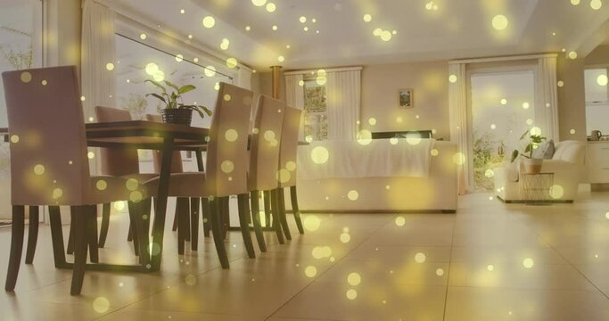 Animation of spots of light over modern kitchen and dining room