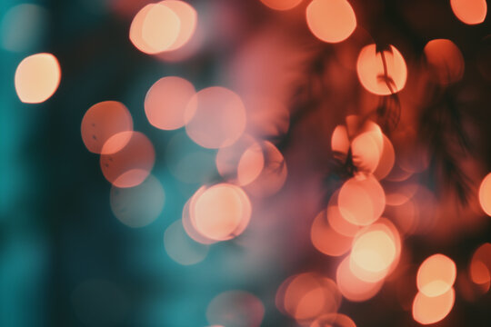 A macro analog-style photo with bokeh, capturing a dreamy ambiance, highlighted by pink, orange, blue, and black tones