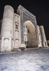 Lyabi Khauz complex mosque madrasah in the ancient city of Bukhara in Uzbekistan, evening exterior