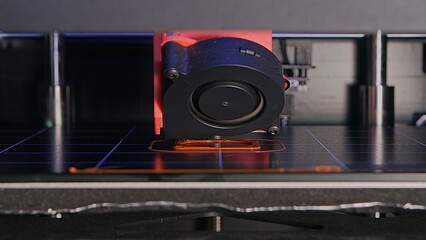 Creativity of a 3D printer printing amazing parts right before your eyes. Watch as each layer of material is brought to life. Close up. Time lapse.