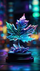 Bright neon-lit crystal maple leaf sculpture stands out with its luminous colours against the dark background of a night setting.