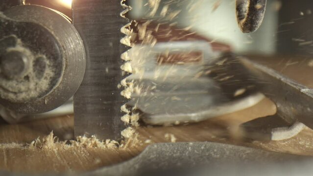 Slow motion 4k Video of a Jigsaw working its way thru wood