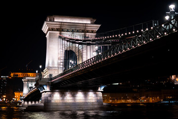 The historic Chain Bridge illuminated at night in Budapest
