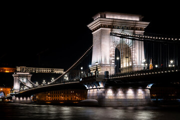 The historic Chain Bridge illuminated at night in Budapest