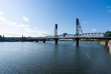 Fototapeta na wymiar A wide-angle photo of the Portland Hawthorne Bridge which passes over the Willamette River.
