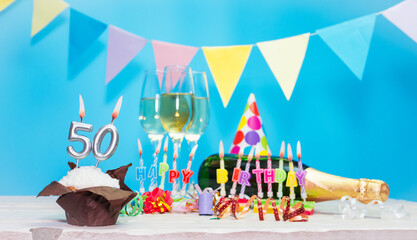 Date of birth with candles and number  50. Anniversary greeting card. Holiday decorations. Happy...