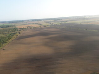 summer morning field view from hot air balloon