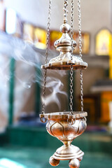 A silver censer or censer, an ecclesiastical object used in the Orthodox or Catholic liturgy. The concept of Orthodoxy. - obrazy, fototapety, plakaty