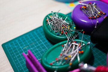Colorful pins in the tailor shop. 
