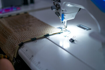 Sewing machine. Close up. Working in the tailor shop. 