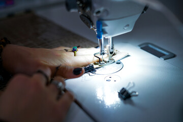 Sewing machine. Close up. Working in the tailor shop. 